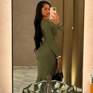 Detail of olive green long sleeve maxi dress featuring slim fit and gathered waist design