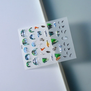 5D embossed nail stickers featuring forest, mountains, and fox motifs with 3D texture