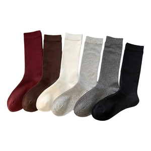 Set of six ribbed combed cotton crew socks in burgundy, beige, and neutral tones