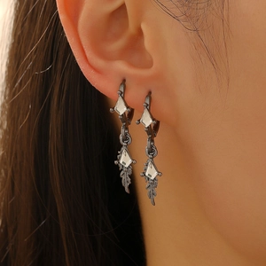 Cool feather design hoop earrings with black metal finish and diamond-shaped crystal gems