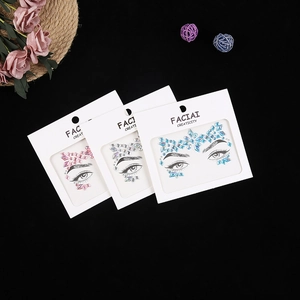 Sparkling face rhinestone stickers in pink, silver, and blue acrylic gem designs