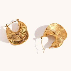 Detail shot of 18K gold plated stainless steel hoop earrings with textured ribbed design