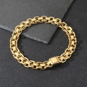 Macro shot of 20mm gold-plated titanium steel chain links with X-shaped hollow design