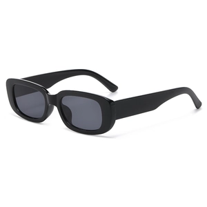 Retro black rectangular sunglasses with thick plastic frames and dark lenses in 45-degree view