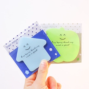 Fluorescent arrow and apple shaped sticky notes with smile patterns in clear packaging
