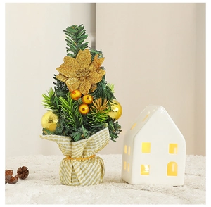 Mini Christmas tree with gold glitter flowers and warm berries on striped base