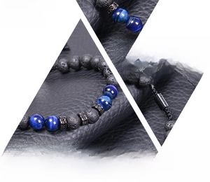 Detailansicht des 8mm Tigerauge und Lavastein Armbands mit verstellbarer Kordel
