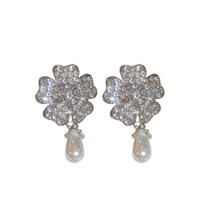 Elegant silver flower clover earrings with sparkling diamonds and teardrop pearl pendants