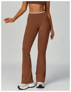 Detail of high-waist yoga flare pants showing high-elastic matte fabric and tummy control