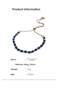 Detail of adjustable silver chain bracelet with teardrop blue zircons on white background