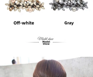 Detail of floral hair clips with pearls and rhinestones in cream and gray colors