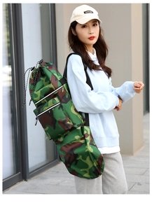 Detail of waterproof camouflage yoga bag with drawstring closure and external zipper pocket