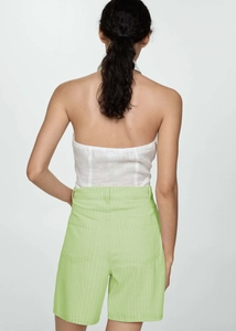 Back view of high-waisted light green striped denim shorts with breathable cotton texture