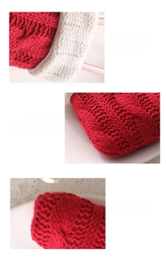 Detailed views of cable knit pattern on red and white mini Christmas stocking cutlery holder