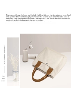 Canvas tote bag for women, casual minimalist shoulder bag with brown handles and front pocket.