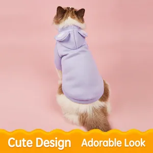 Lavender pet hoodie with cute ear accents for cats and small dogs on a pink background
