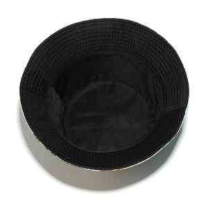Detail of the dense stitching on the brim and colorful floral print of the sun hat