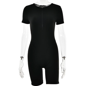 Detail of a black slim-fit short sleeve romper with front zipper closure on white background