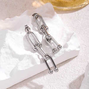 Minimalist silver horseshoe link earrings with spherical beads on stone base