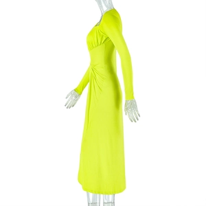 Detail of lime green ruched midi dress showing elegant slim fit and side drawstring folds