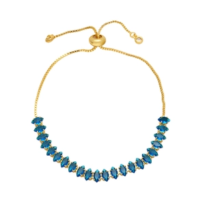 Adjustable gold bolo bracelet featuring marquise-cut blue cubic zirconia stones