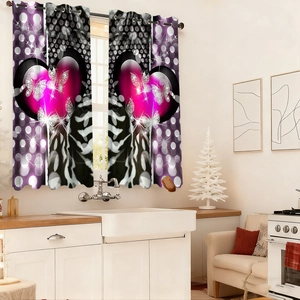 Detail of velvet blackout curtains with purple heart and butterfly print on metal grommets