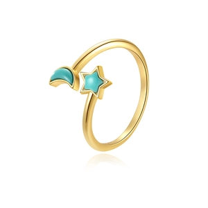 Detailed shot of gold celestial open ring with turquoise star and moon charms