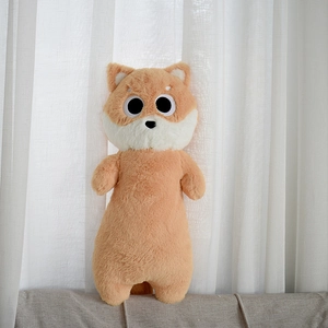 Detail of soft plush fabric and cute shiba inu face on a long dog body pillow