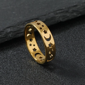 Polished gold stainless steel wide ring with hollowed star and moon pattern design