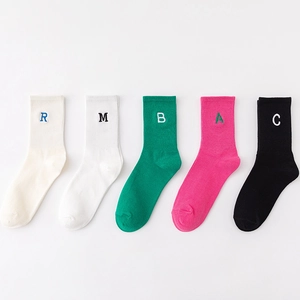 Five pairs of cotton mid-calf sports socks with ABC letter embroidery in various colors