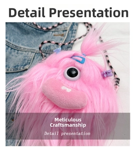 Detailed macro view of pink plush monster bag showing long faux fur and large eye