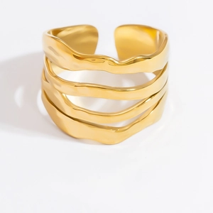 Polished 18k gold plated stainless steel wave ring with a multi-layer lava texture