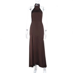 Detail of elegant dark brown satin long dress with a high slit and halter neckline