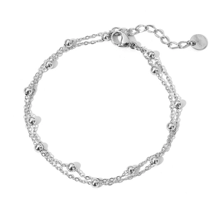 Macro detail of silver double-layered bead anklet with stainless steel clasp and S-STEEL tag