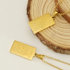 18K gold plated stainless steel tarot necklaces featuring sun, moon and lion designs