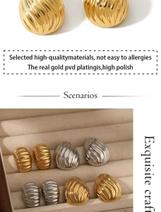 Detail of gold and silver ribbed earrings with high polish and real gold PVD plating