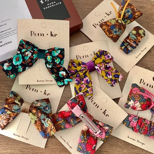 Floral fabric hair bow clips and ties set for girls in various colorful Korean designs