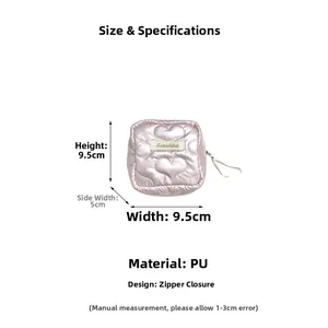 Detailed dimensions of a pink PU heart-quilted sanitary pouch with secure zipper closure
