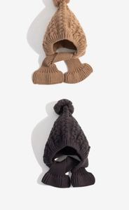 Close-up of integrated knitted hat and scarf sets in brown and dark grey colors