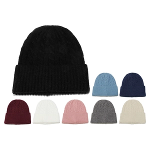 Detailed knit texture and fold-over cuff design of cable knit beanies in 8 varied colors