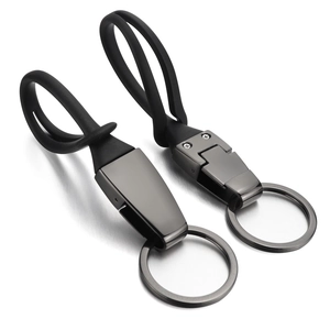 Minimalist black titanium car keychain with premium metal and rubber finish for men