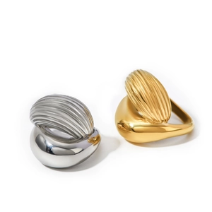 Polished 18k gold and silver stainless steel rings with textured teardrop design