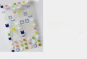 Detail shot of multi-colored cute rabbit 3D nail art stickers with S-080F numbering