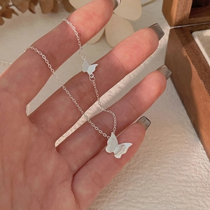 Elegant 925 sterling silver choker necklace with white butterfly pendants and delicate chain