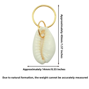 Macro detail of natural shell pendant with golden alloy rings for hair jewelry DIY