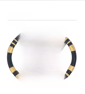 Detail of black and gold enamel open bangle with 5.5cm inner diameter copper material