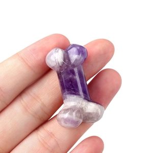 Miniature carved bone statue made of natural purple crystal and fluorite gemstone