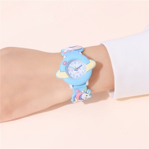 Close-up of kids quartz watch with 3D unicorn silicone strap and colorful dial