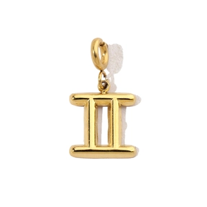 Detail of gold-plated stainless steel Gemini zodiac pendant with a polished mirror finish