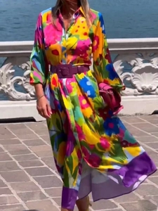 Elegant floral print long sleeve shirt dress with purple belt and matching handbag